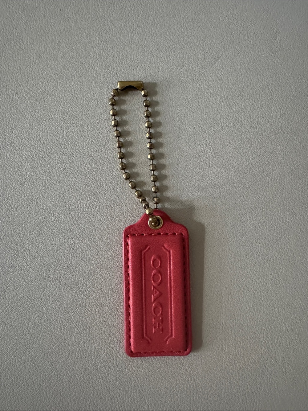 Vintage small COACH Pink Leather Tag with Gold-Tone Bead Chain
